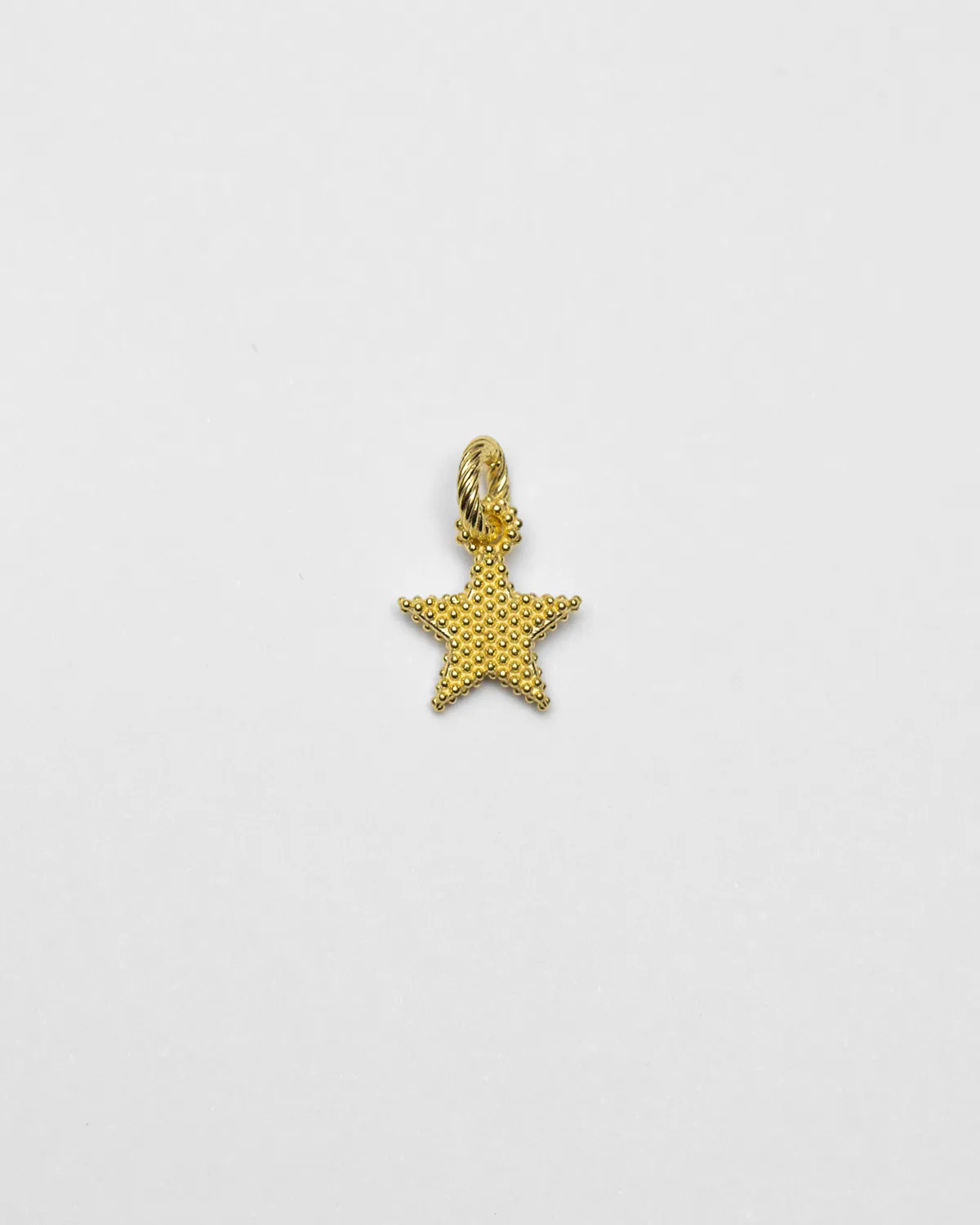 CIONDOLO CHARM STELLA PUNTINATA PLACCATO ORO