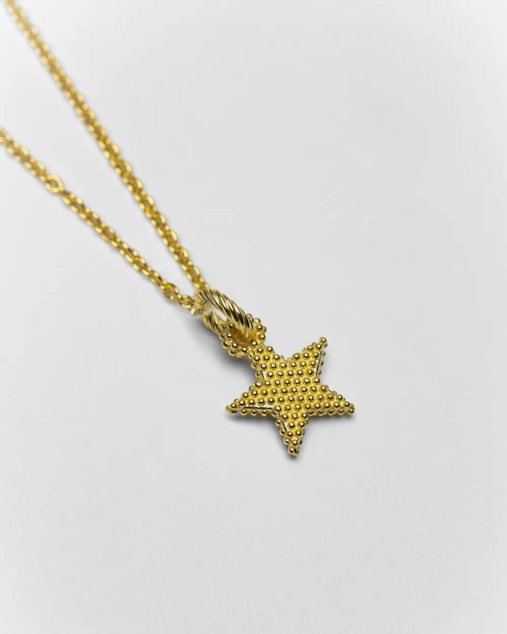 CIONDOLO CHARM STELLA PUNTINATA PLACCATO ORO
