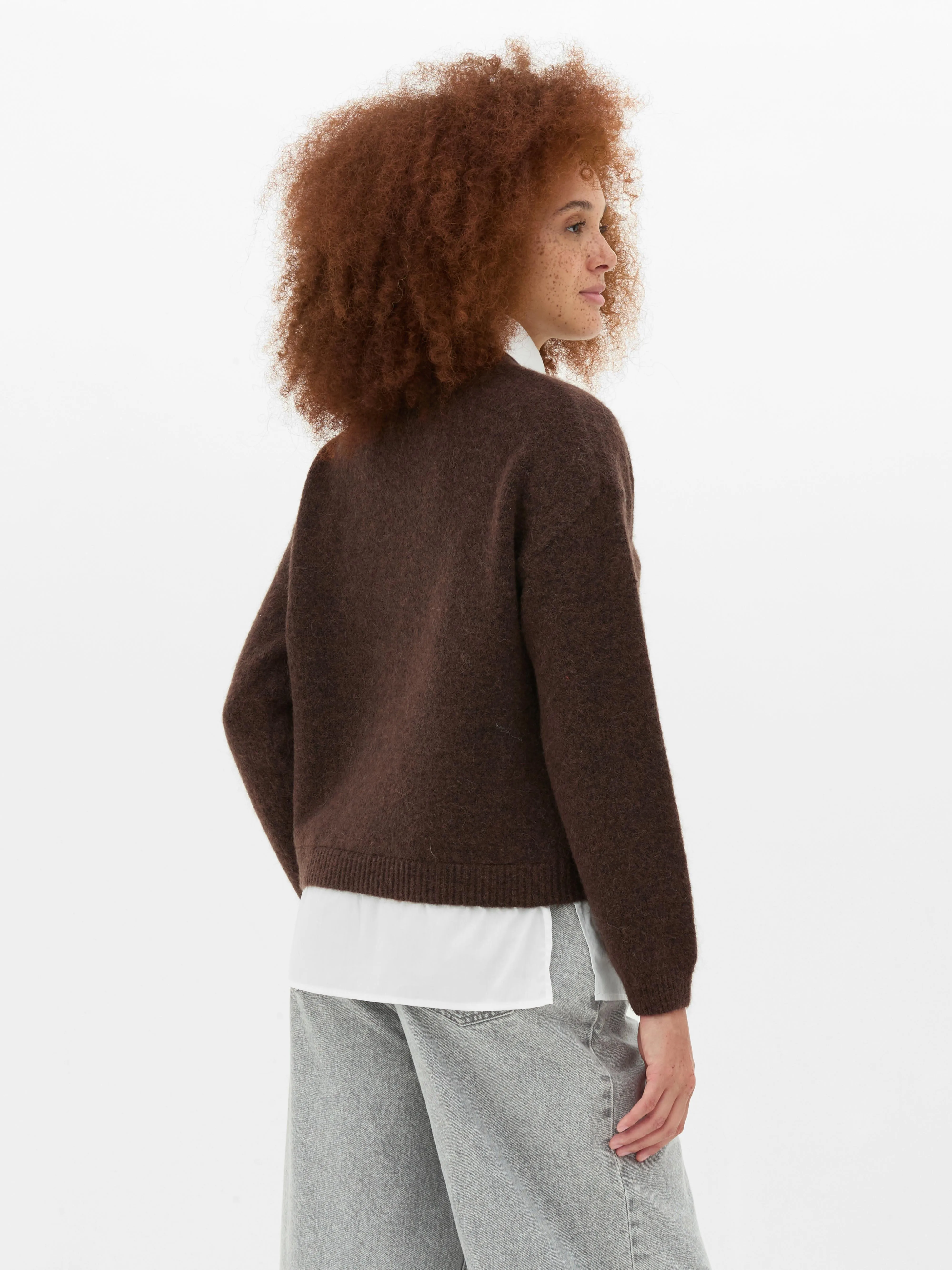 Maglione e camicia lavorati a maglia 2-in-1