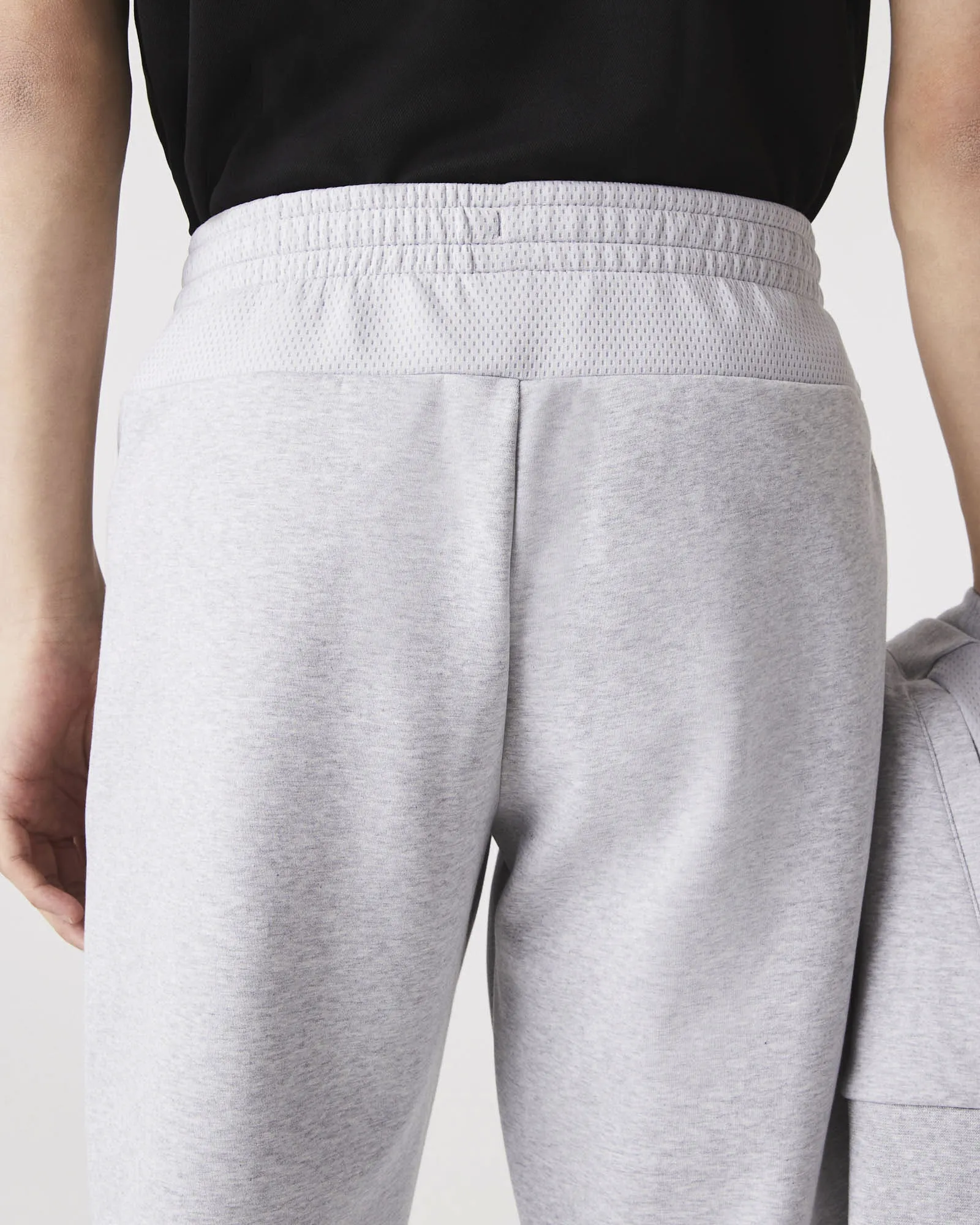 Pantalone grigio in interlock di cotone con inserto in mesh