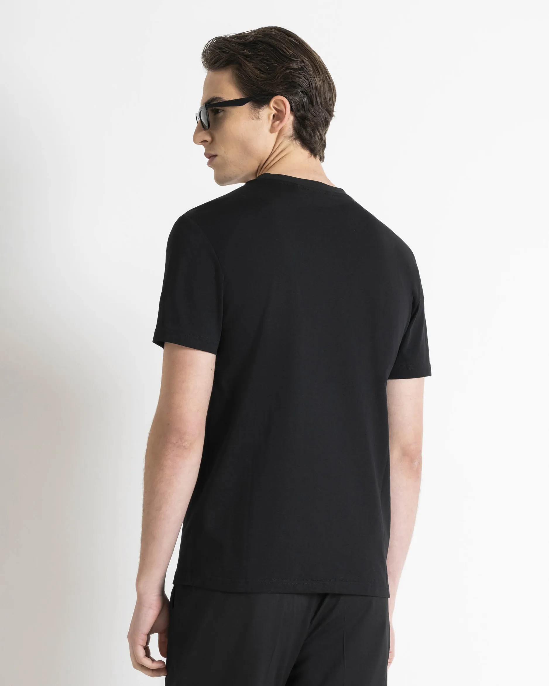 T-shirt nera mezza manica in jersey di cotone slim-fit con logo graffiti