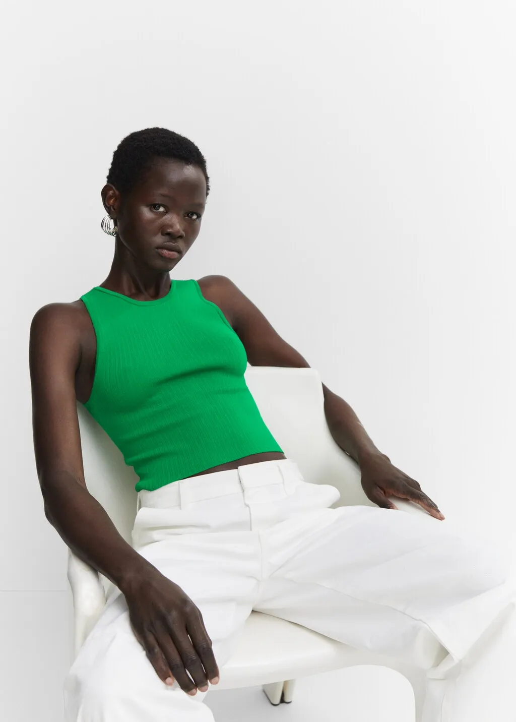 Top maglia a coste zip