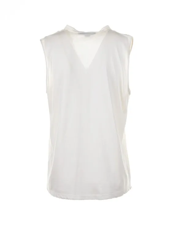 White sleeveless blouse